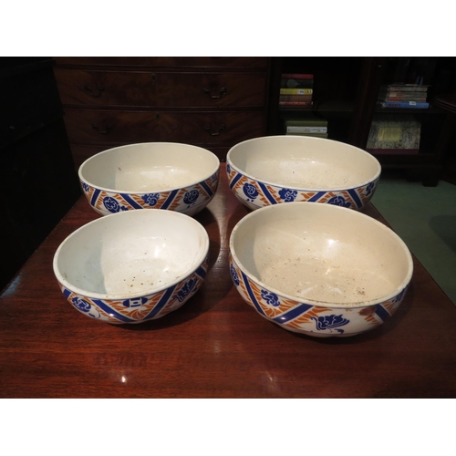 4071 - A set of four graduating bowls, 'Orchies' by Moulin des Loups Hamage, hairline to smallest