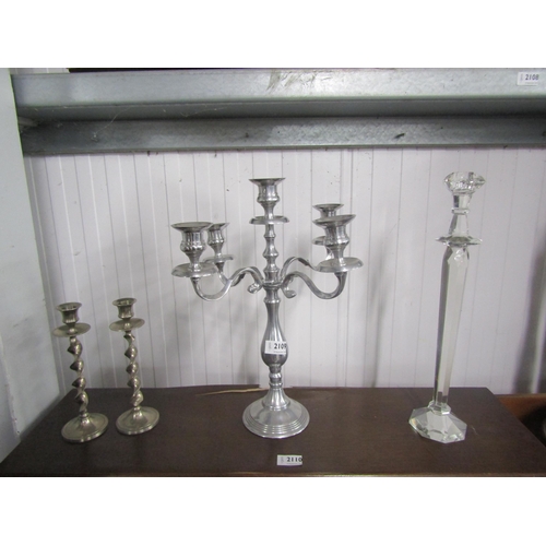 2109 - An alloy five-arm candlestick and three others (4)