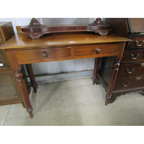 2111 - A Victorian mahogany two drawer side table