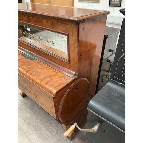 9004 - A Pasquale 48 note hand-wound barrel piano, Tomasso pinned. Walnut cased with incised scrolled folia... 