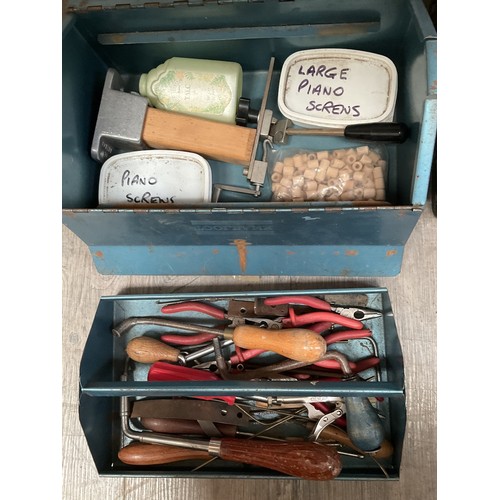 9015 - A toolbox with piano tool contents including tuning handles, pliers etc and a quantity of pins. 

Co... 