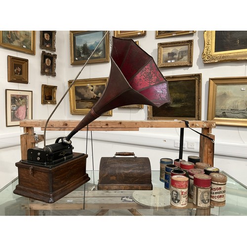 9016 - An Edison 'Fireside' two-speed phonograph together with a quantity of cylinders. Red metal horn, wit... 