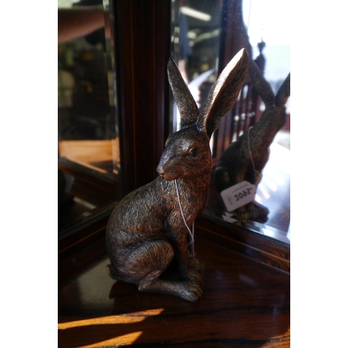 2095 - A resin bronze shelf sitting hare