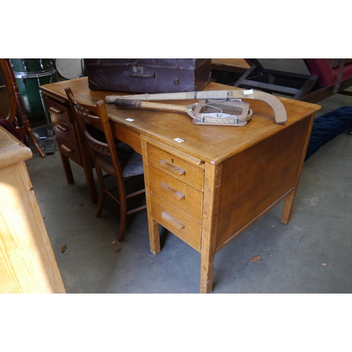 2419 - A 1940's light oak desk and chair