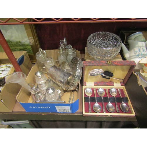 4469 - A box containing a selection of glass and plated wares including an ornate desk stand with winged fi... 