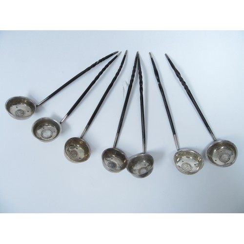 6348 - Seven Scottish William IV whale bone handled toddy ladles with coin set bowls, Edinburgh.  Diameter ... 