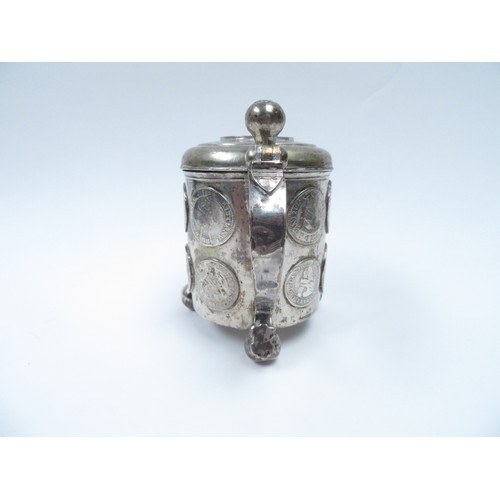 6378 - A Danish/Scandinavian silver peg tankard inset with coins from the 17th Century.  The top set with C... 