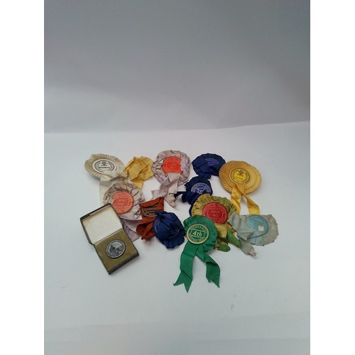 8241 - A collection of rosettes including 2nd Bakewell Show and a cased 'Smallholder Championship Medal'