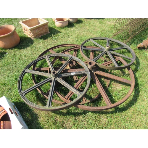 8017 - A set of four iron shepherd hut wheels; one pair 30.5