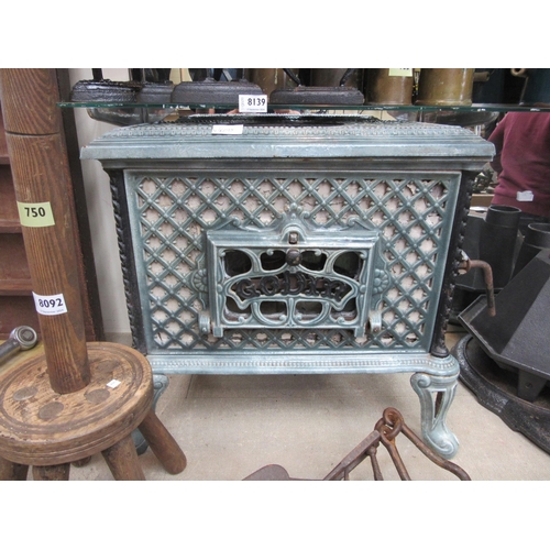 8093 - A French Godin decorative enamelled stove on shaped legs