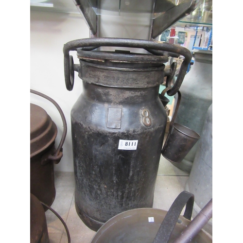 8111 - A metal milk churn with a half-pint cup