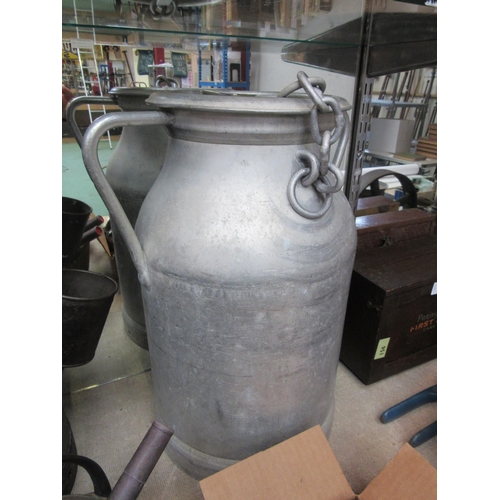 8112 - A French aluminium milk churn with lid.  Monogrammed LBY.  47cm high