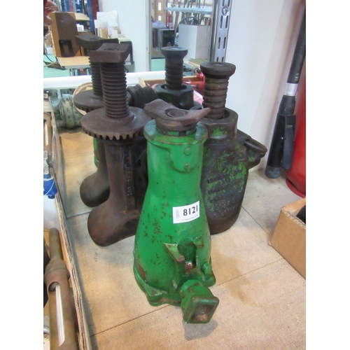 8121 - Three vintage car jacks