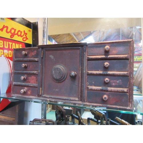 8149 - A late 19th/early 20th Century eight drawer, single door table top cabinet