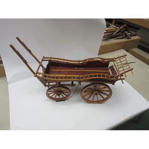 8162 - A wooden model of a four wheel hay cart with hand paintd lettering to front; F.D Stigwood, Friston H... 