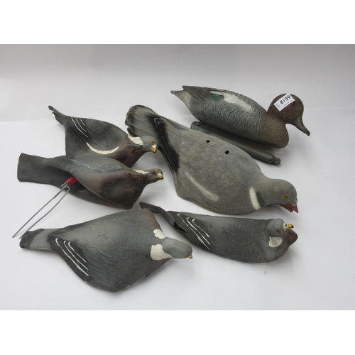 8199 - A collection of rubber decoy pigeons and a duck