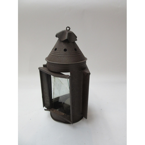 8227 - A tinware three aspects (one a/f) shepherds candle lantern