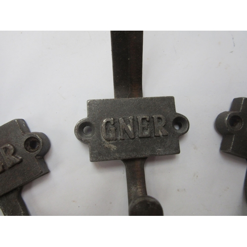 8248 - Six cast coat hooks stamped GNER