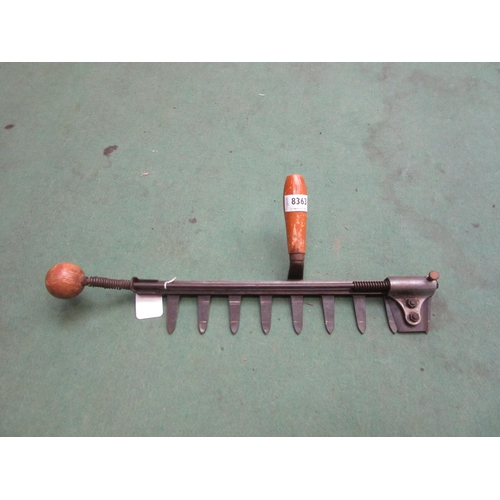 8363 - A Code-Halftime side push action multi-cut hedge trimmer