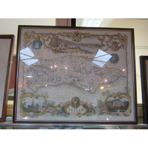 8365 - A framed and glazed coloured print of an etching map of Sussex