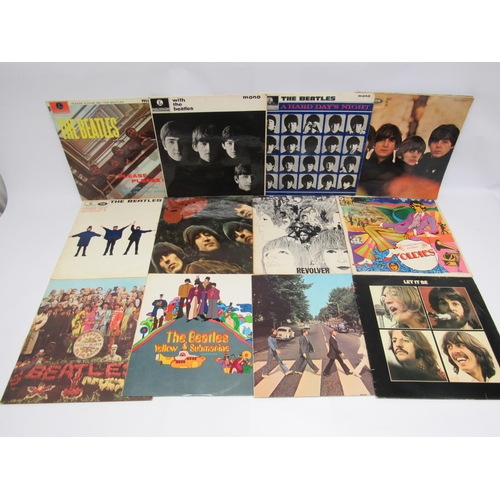 7091 - THE BEATLES: A collection of twelve LPs, Parlophone releases having black and yellow labels except w... 