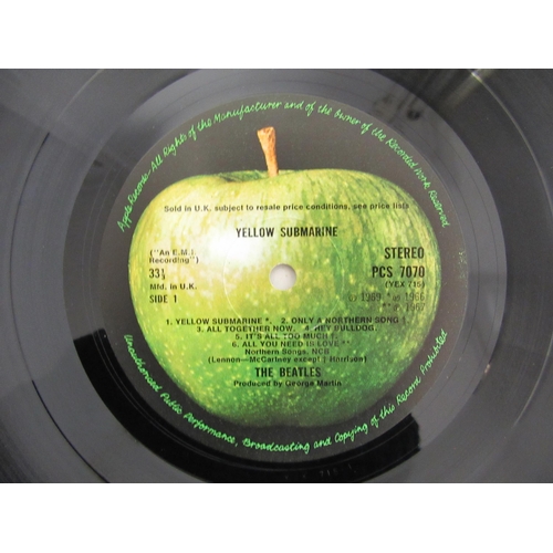 7091 - THE BEATLES: A collection of twelve LPs, Parlophone releases having black and yellow labels except w... 