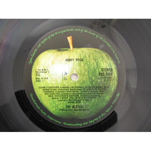 7091 - THE BEATLES: A collection of twelve LPs, Parlophone releases having black and yellow labels except w... 