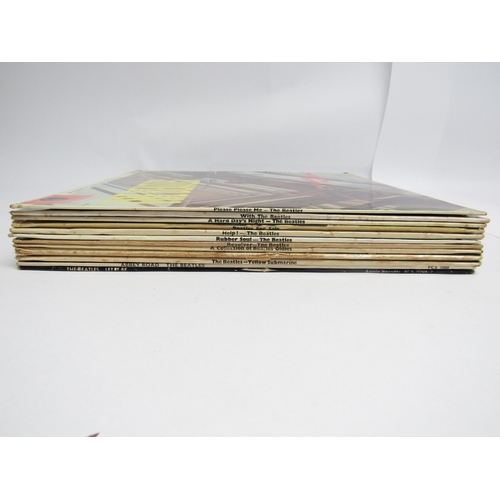 7091 - THE BEATLES: A collection of twelve LPs, Parlophone releases having black and yellow labels except w... 