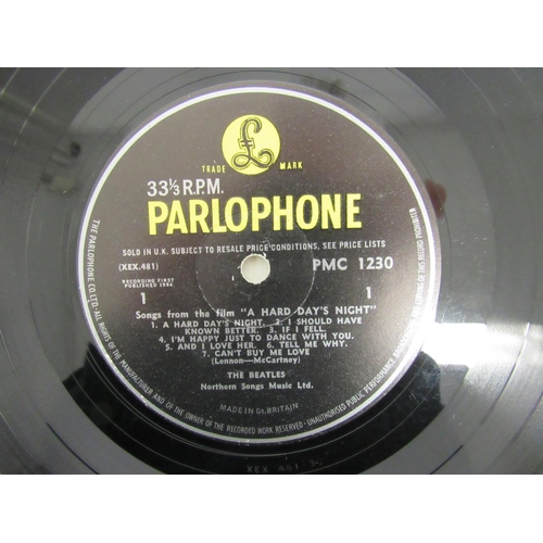 7091 - THE BEATLES: A collection of twelve LPs, Parlophone releases having black and yellow labels except w... 