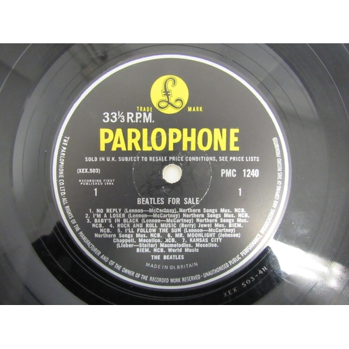 7091 - THE BEATLES: A collection of twelve LPs, Parlophone releases having black and yellow labels except w... 