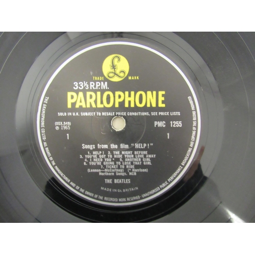 7091 - THE BEATLES: A collection of twelve LPs, Parlophone releases having black and yellow labels except w... 