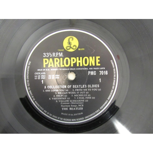 7091 - THE BEATLES: A collection of twelve LPs, Parlophone releases having black and yellow labels except w... 