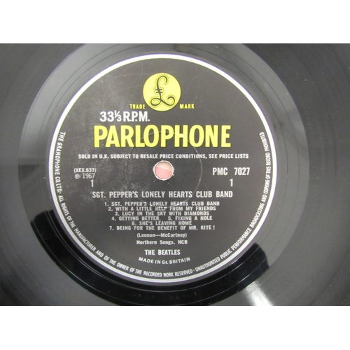 7091 - THE BEATLES: A collection of twelve LPs, Parlophone releases having black and yellow labels except w... 