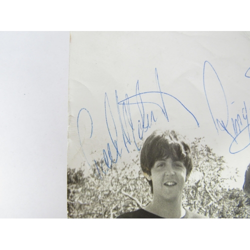 7290 - THE BEATLES: A signed 8 x 10