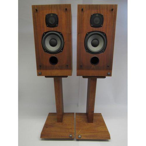 7360 - A pair Castle Warwick speakers in natural wood finish, on stands