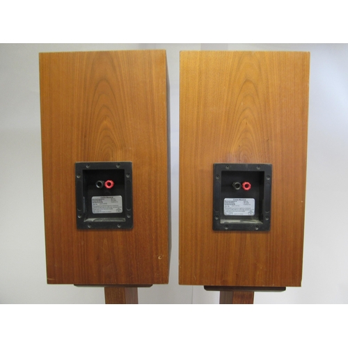 7360 - A pair Castle Warwick speakers in natural wood finish, on stands