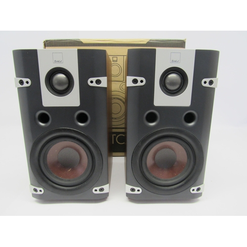 7334 - A pair of Dali Lektor 1 bookshelf speakers in walnut finish, boxed with manual