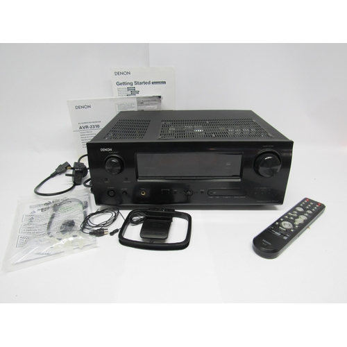 7383 - A Denon AVR-2310 AV surround receiver with remote control and manuals