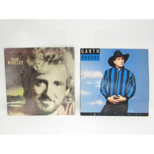 7066 - Country- Two country music LPs to include Keith Whitley- 'I Wonder What Do You Think Of Me' (RCA 980... 