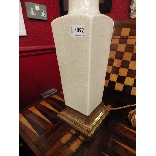 4052 - A celadon style vase shape table lamp on a decorative gilt base