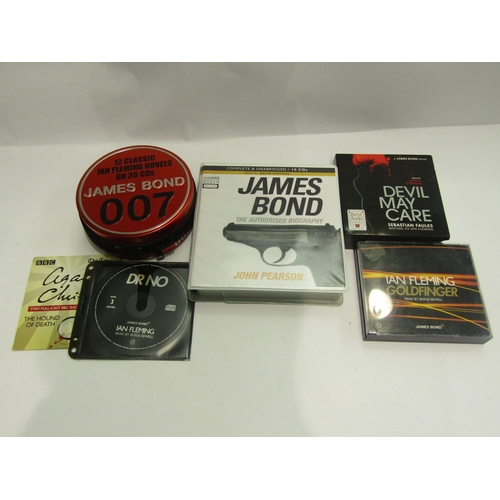 4472 - A bag containing a collection of James Bond related items including a set of fourteen 