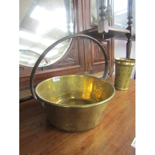 2093 - A brass cooking pan with an iron handle