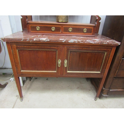 2149 - An Edwardian inlaid mahogany marble topped wash stand