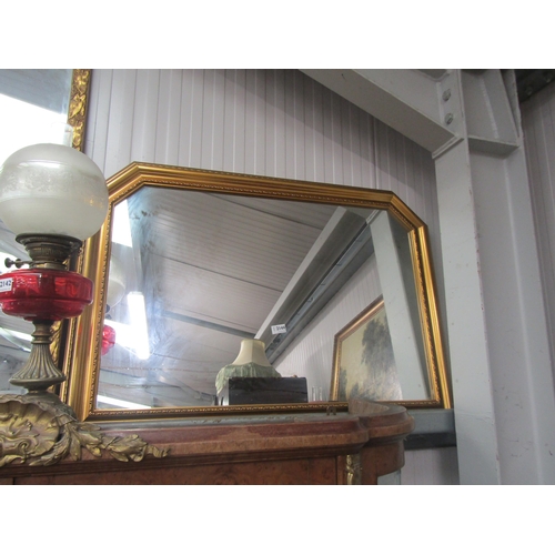 2153 - A gilt overmantel mirror