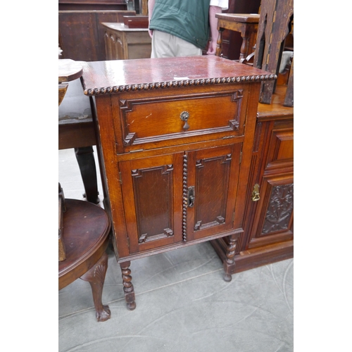 2212 - A 1930's oak record cabinet