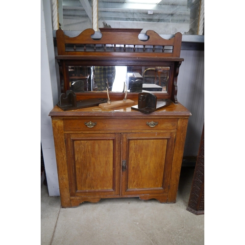 2214 - An Edwardian walnut mirror back chiffonier