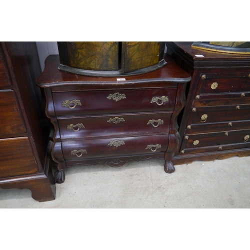 2221 - A Continental chest of three drawers