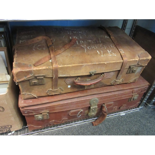 1534 - Two bygone suitcases with post WWII military uniforms including RAF dress uniform