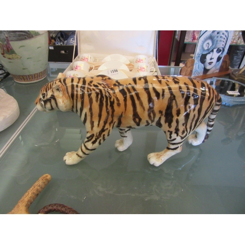 1597 - A Winstanley tiger, 36cm long