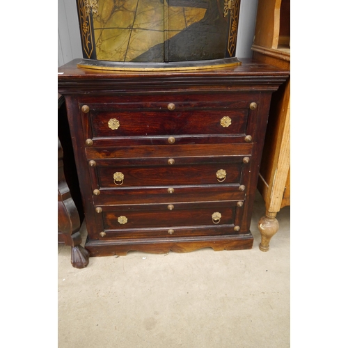 2226 - A mahogany three drawer chest of drawers